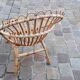 Pairs of shell rattan armchairs from the 50