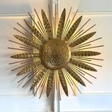 Large golden hammered metal sun wall light with a diameter of 90 cm from the year