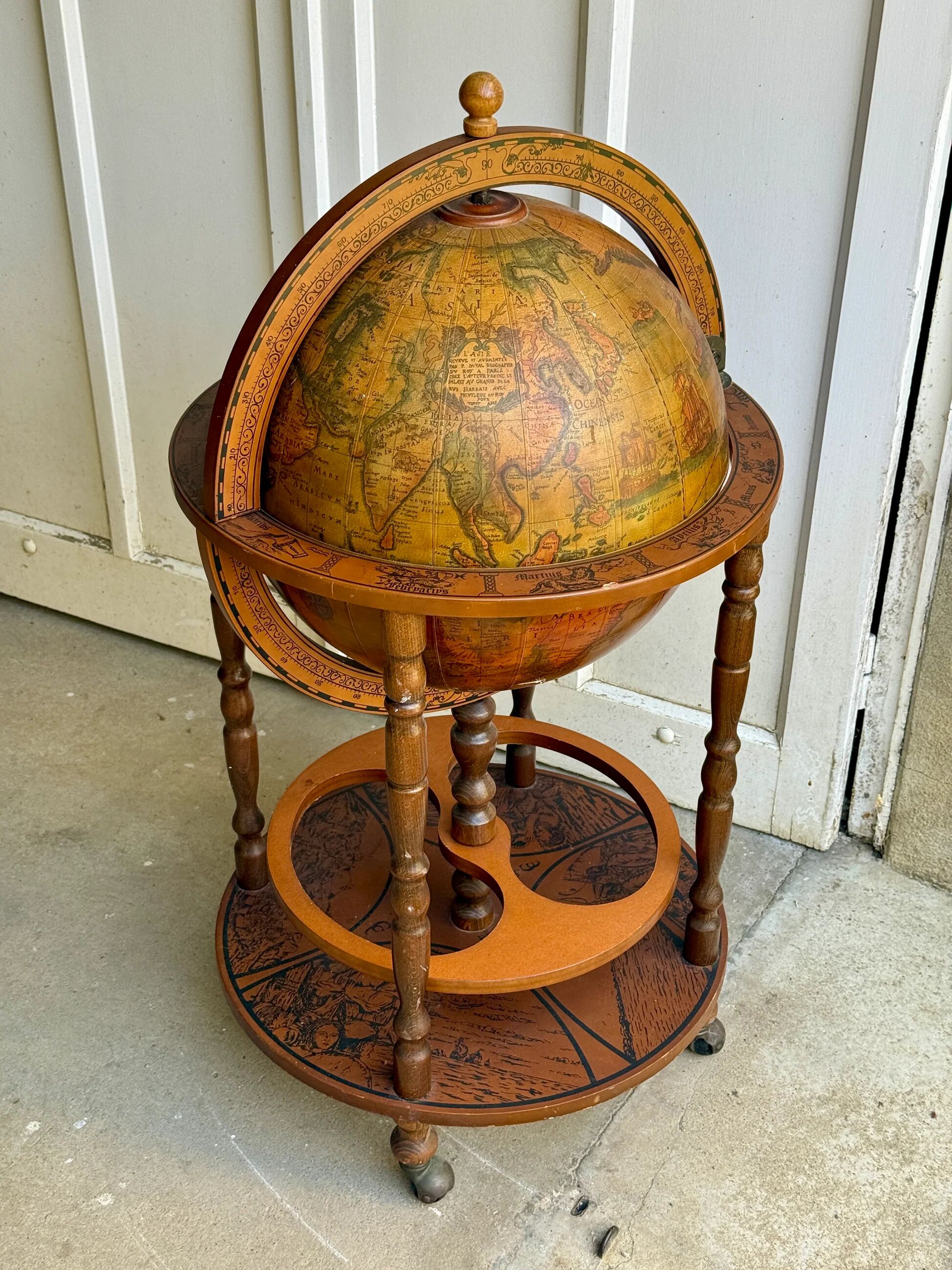 Globe bar on wheels with a rotating tray