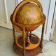 Globe bar on wheels with a rotating tray