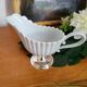 Porcelain and silver-plated gravy boat