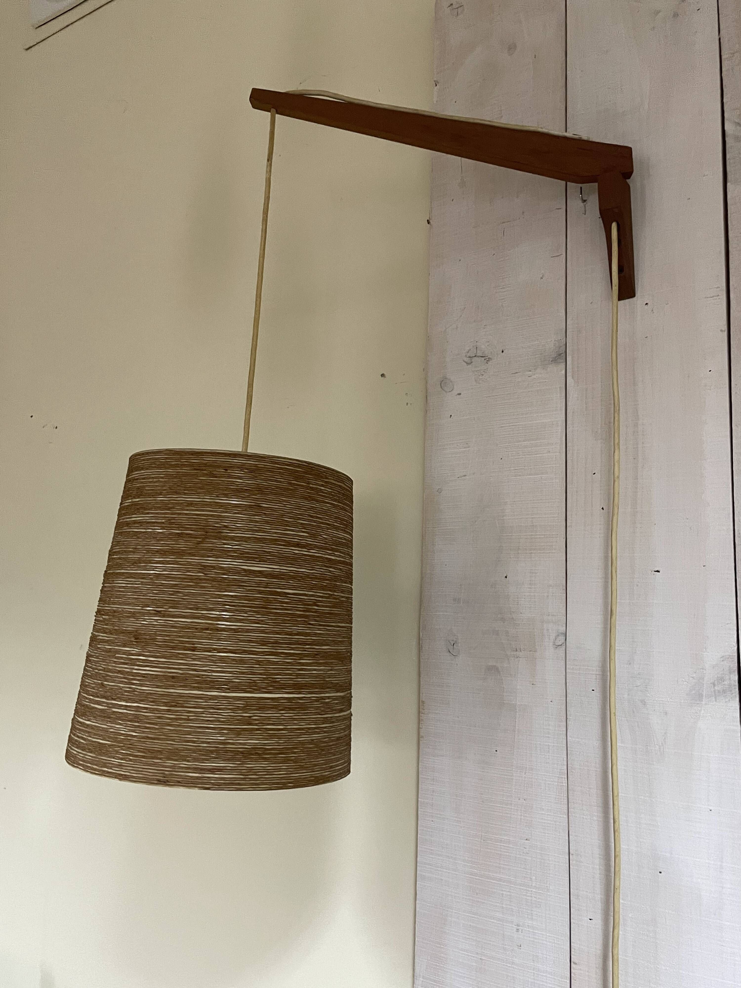 Rare teak and sisal wall lamp from the 1960s, attributed to Lotte Bostlund.