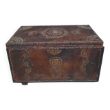 Chest covered with leather and nails