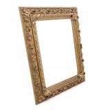 Antique mirror in richly decorated frame, France.