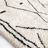 Beni Ouarain ecru Berber rug with black patterns 250x147cm