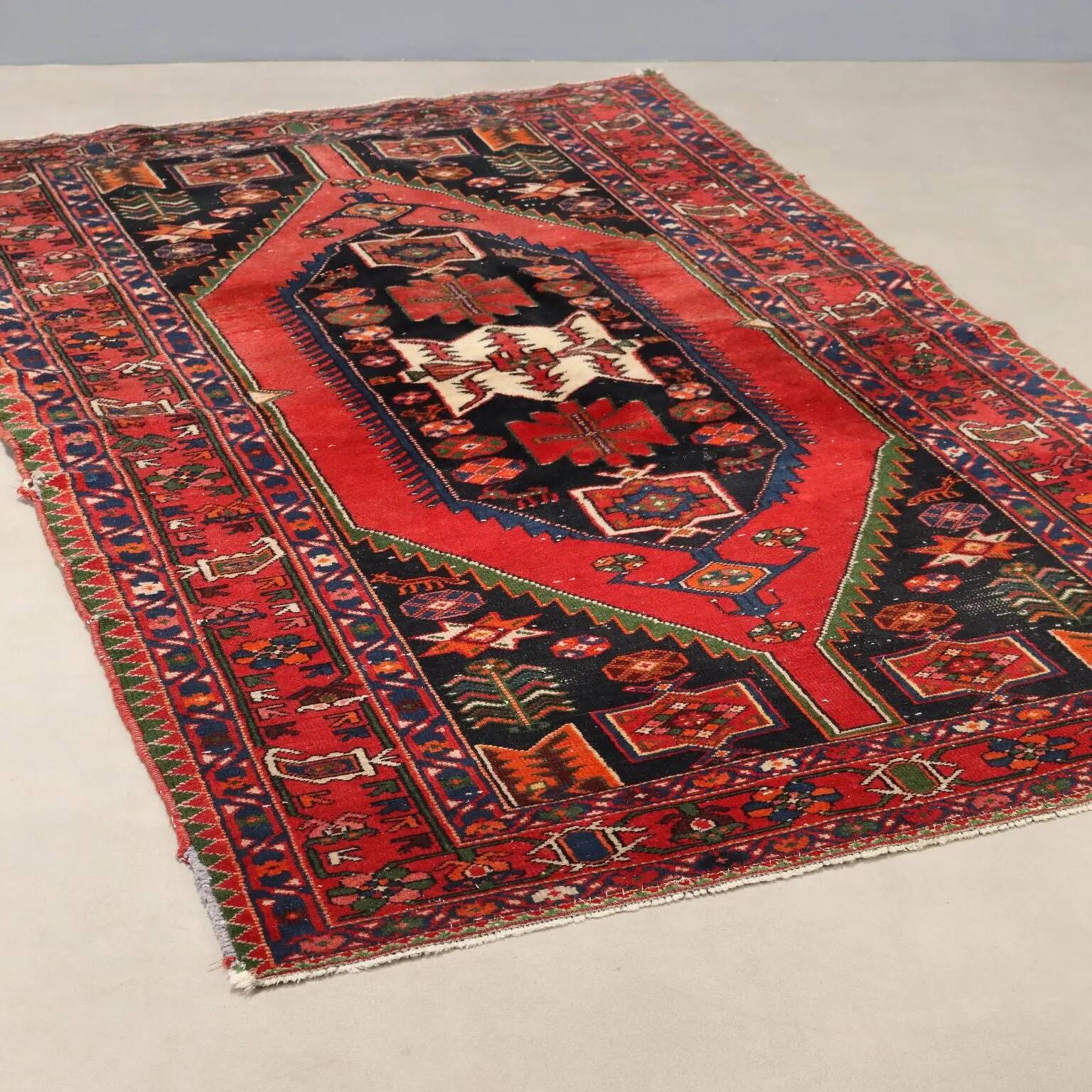 Ancient Asian rug made of cotton and wool, large knot.