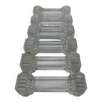6 Portieux Art Deco knife rests in transparent moulded glass, French glassware from the 1930s.