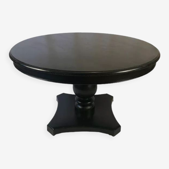 Circular table in blackened wood, central baluster leg