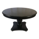 Circular table in blackened wood, central baluster leg