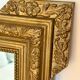Large golden Napoleon mirror