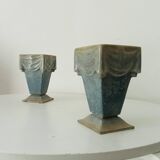 Pair of old art deco vases in enameled cast iron