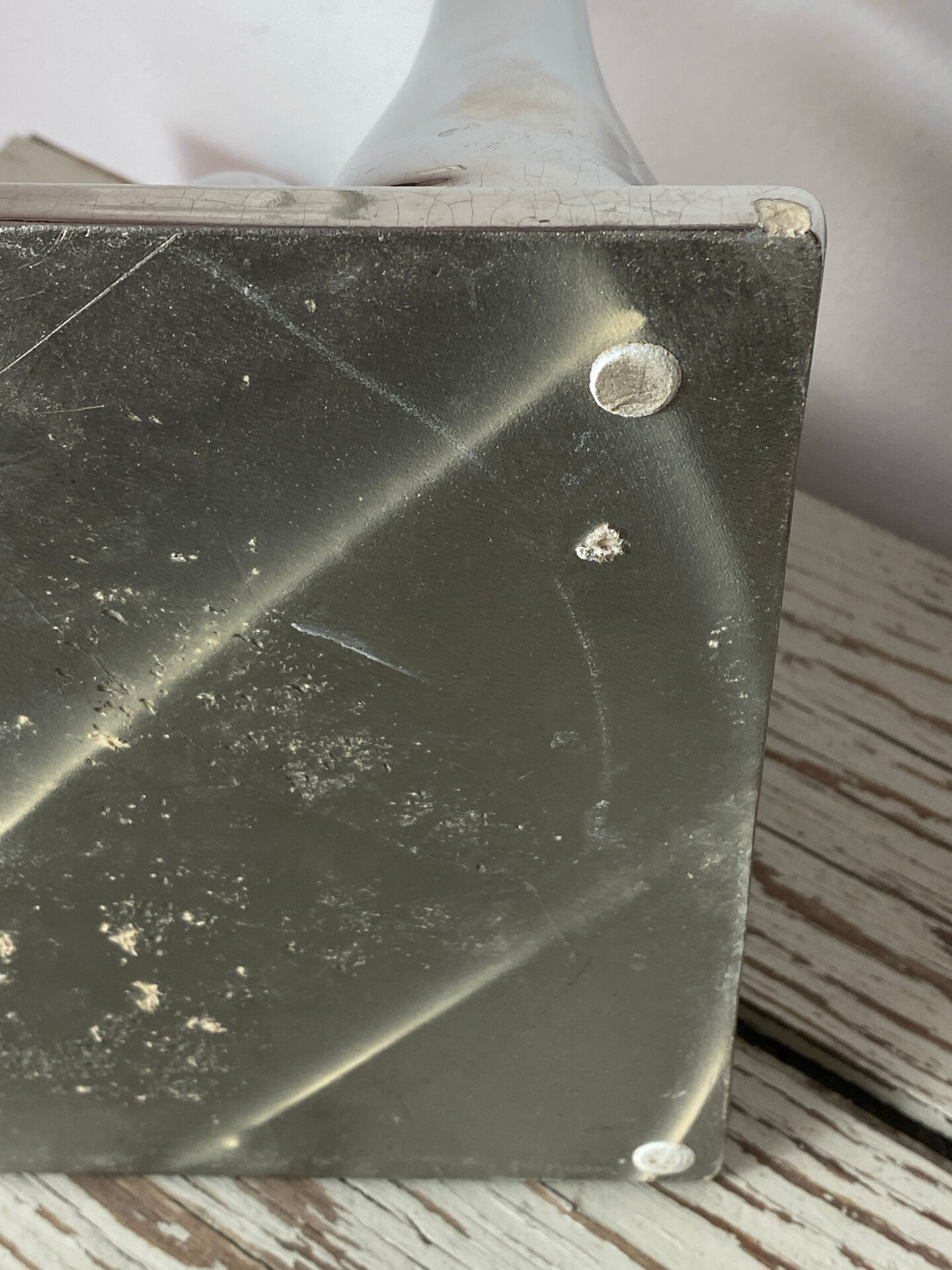 Asymmetrical multitube vase on a base, in silvered ceramic, 1970.