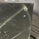 Asymmetrical multitube vase on a base, in silvered ceramic, 1970.