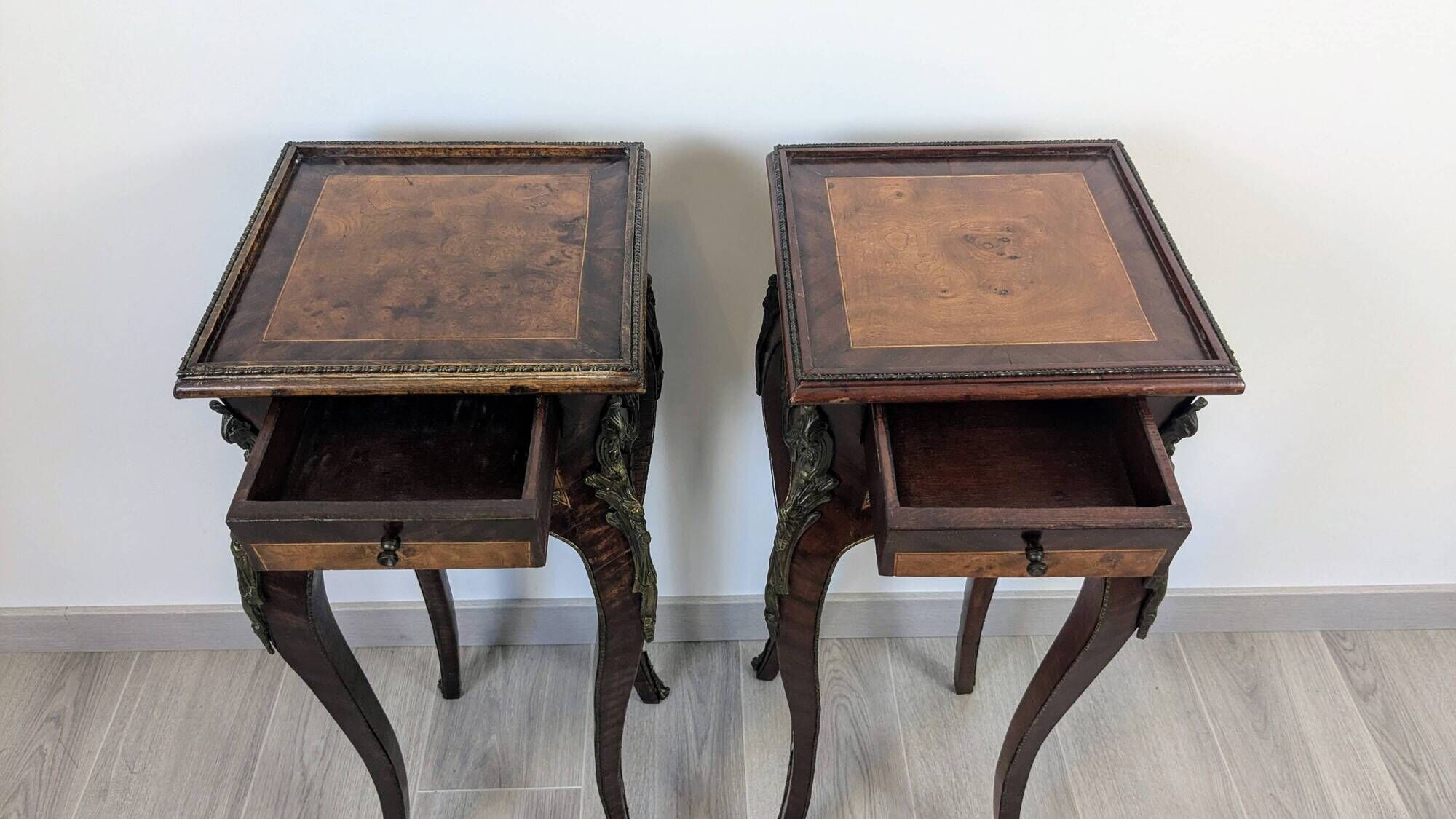Pair of Louis XV bedside tables with marquetry and gilded bronzes