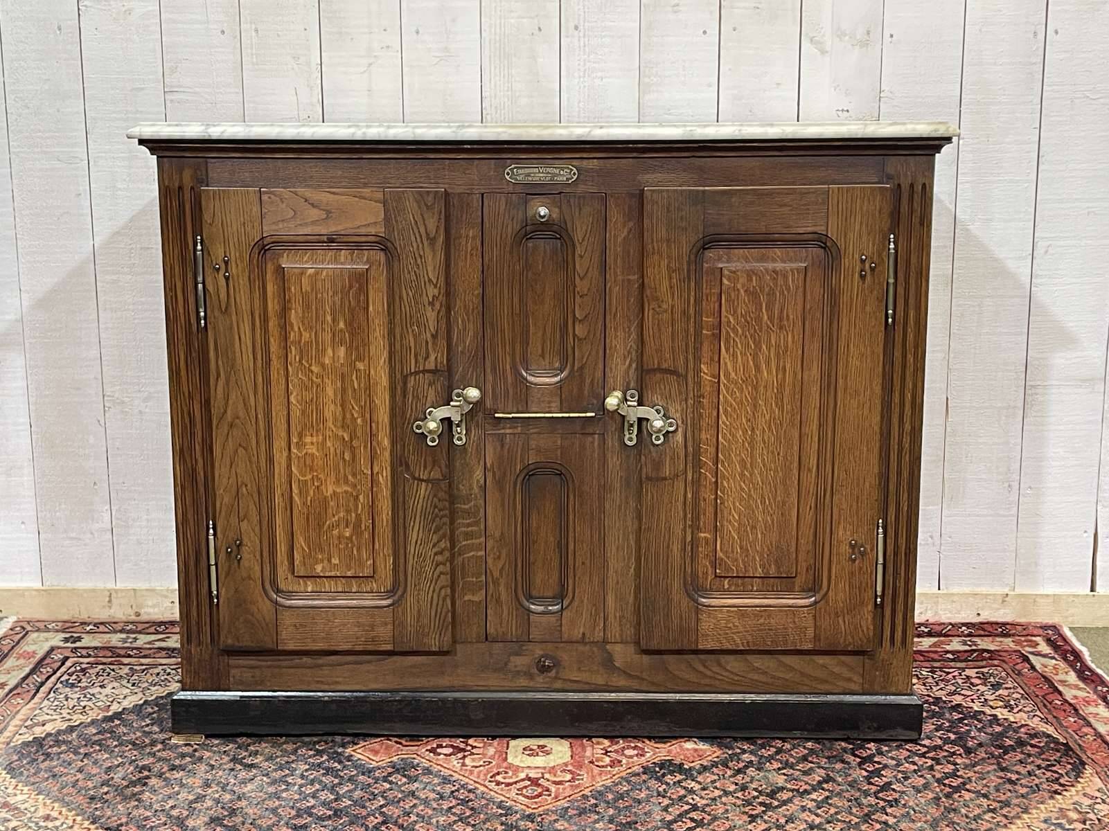 Glacière début XXème en chêne et dessus marbre