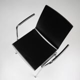 Mid-century modern black design chair in with armrests, Belgium