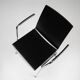 Mid-century modern black design chair in with armrests, Belgium