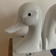 Vintage bookends in the shape of a goose or ceramic duck