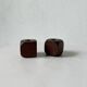 Pair of 1960s teak and brass "dice" candlesticks