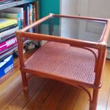 Varnished rattan coffee table and smoked glass top