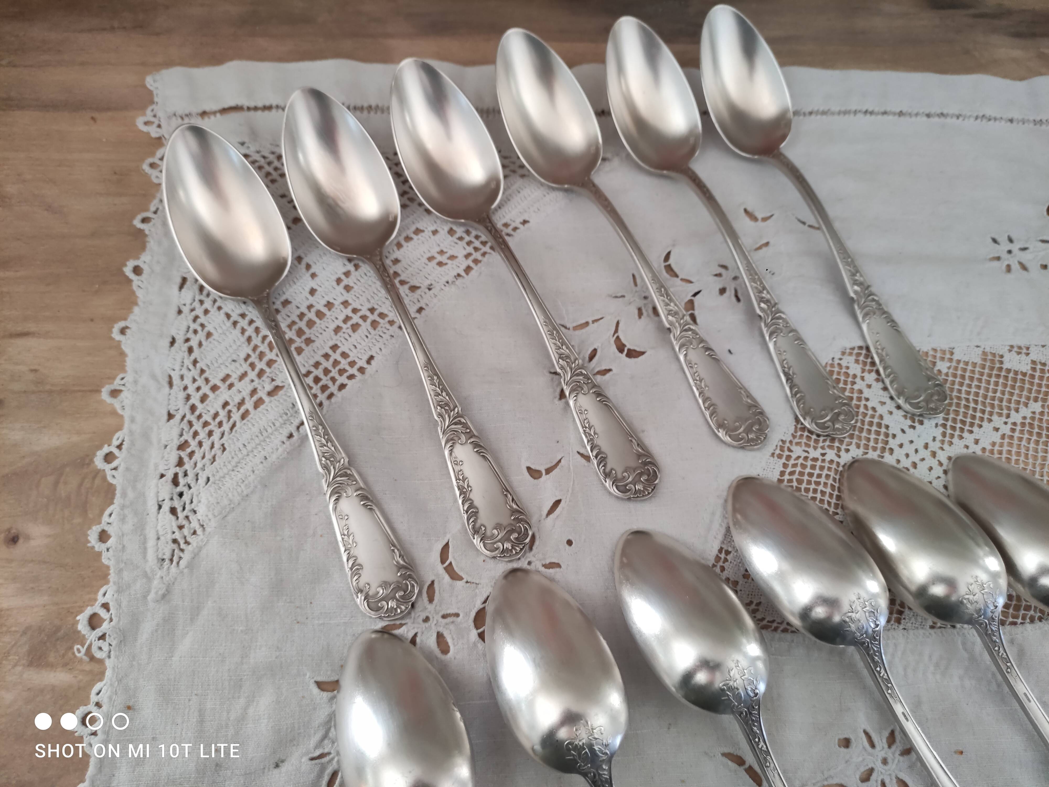 Set of 12 old silver-plated soup spoons