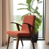 Vintage orange curly papaya armchair 1970