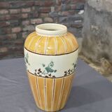 Orange and green ceramic vase with duck motif