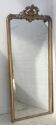 Miroir de style Louis XV en bois et stuc doré