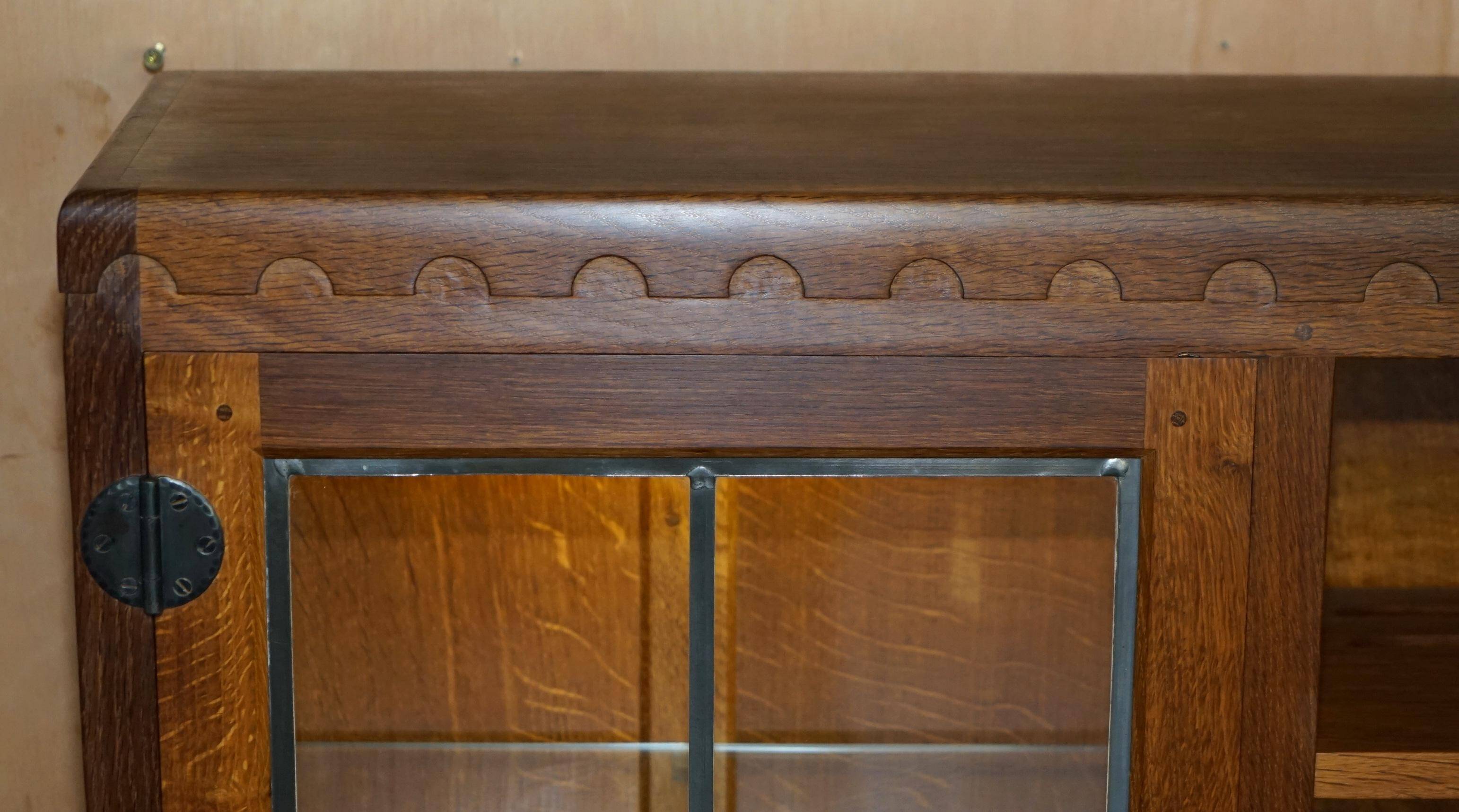 Vintage Robert Mouseman Thompson oak display cabinet with shelves and lighting.