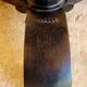 Old vintage bistro table brand Fischel in cast iron