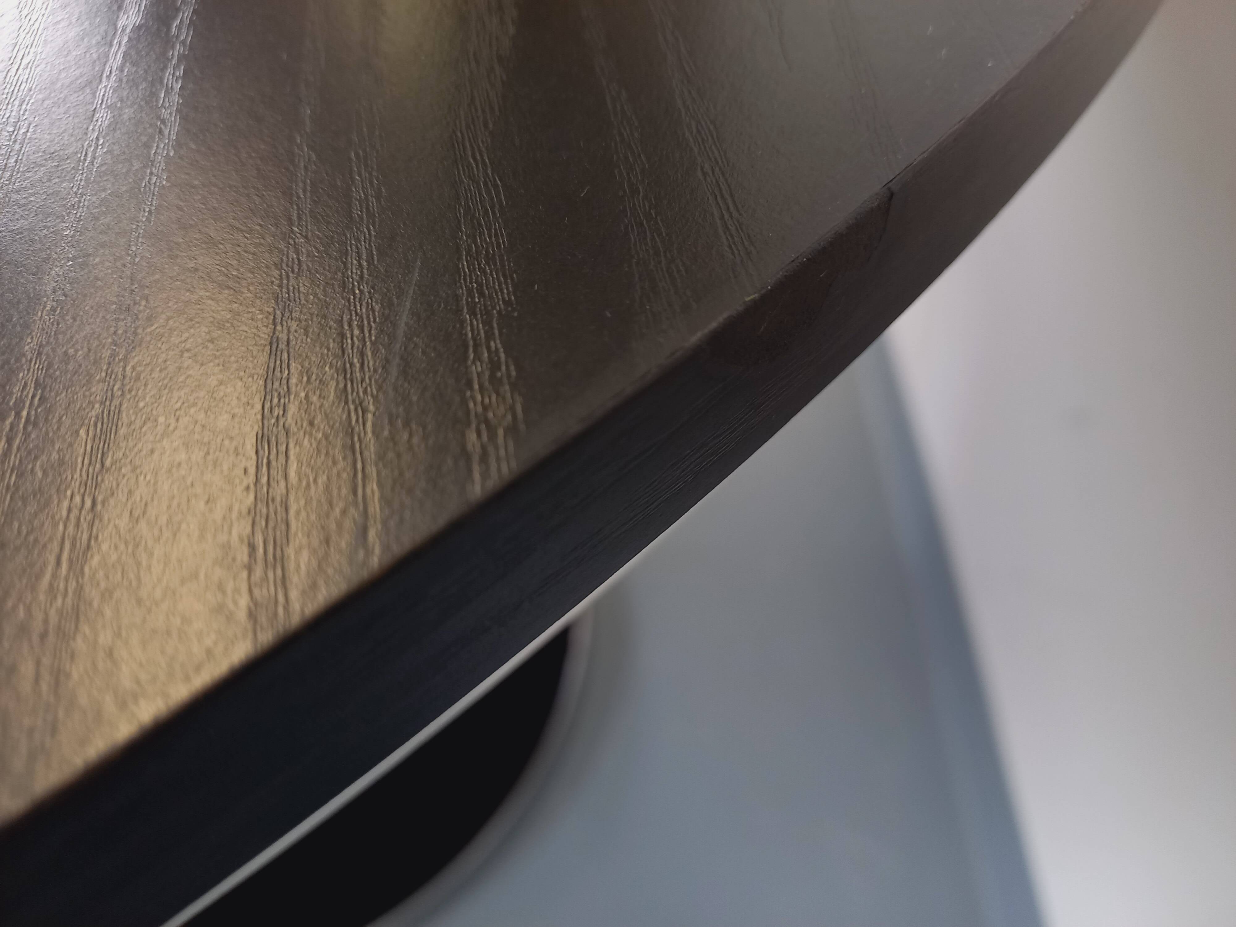 Vintage dining table in melamine with a black wood effect and chrome metal.