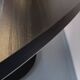 Vintage dining table in melamine with a black wood effect and chrome metal.
