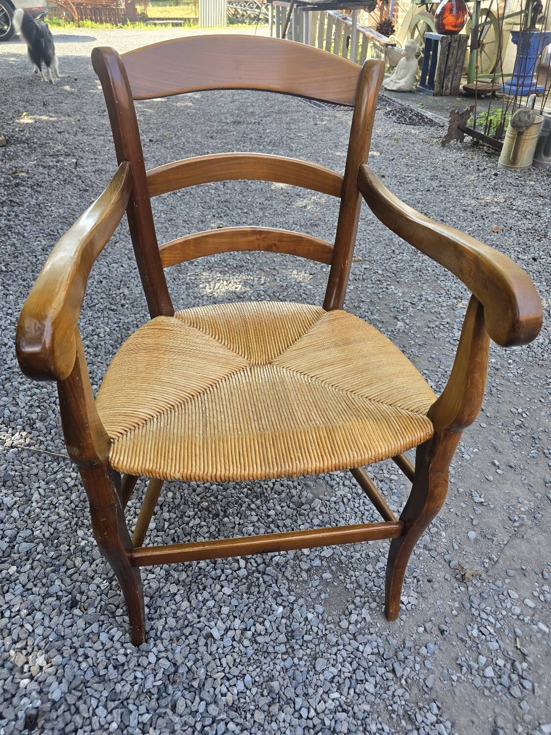 Cherry wood straw armchair