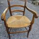 Cherry wood straw armchair
