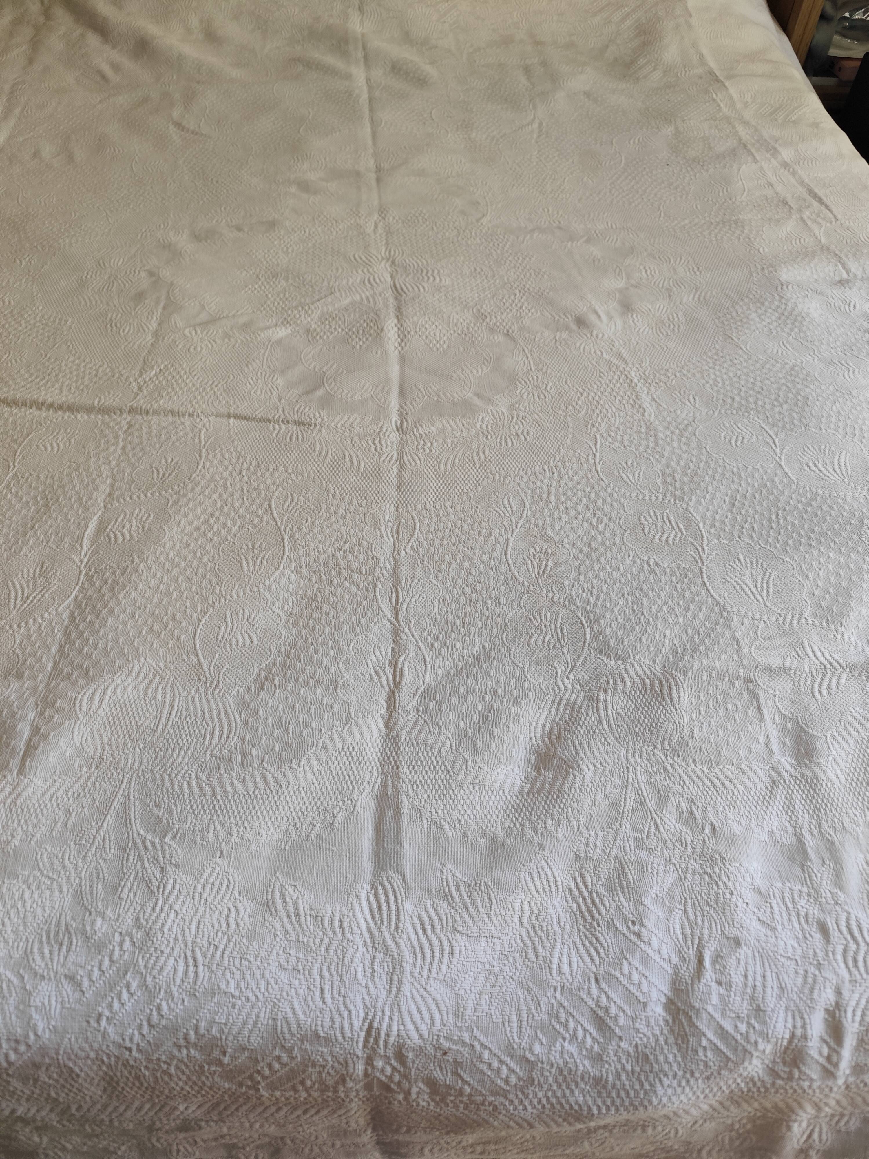 White woven cotton bedspread with fringes
