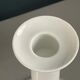 Pair of porcelain candlesticks with a gold pattern.