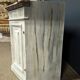 Low patinated sideboard with griotte marble top