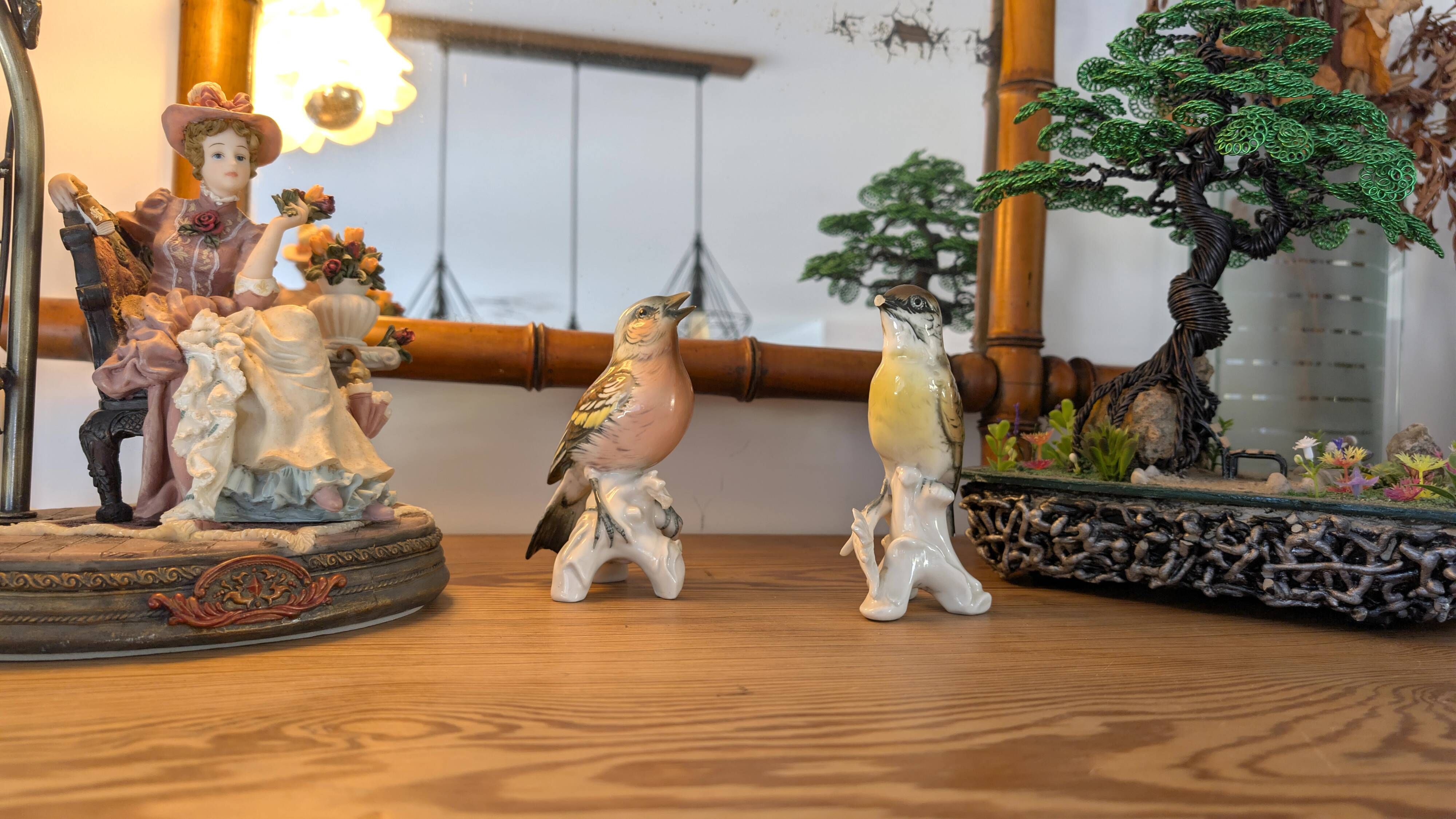 Pair of Karl Ens polychrome porcelain birds from Saxony