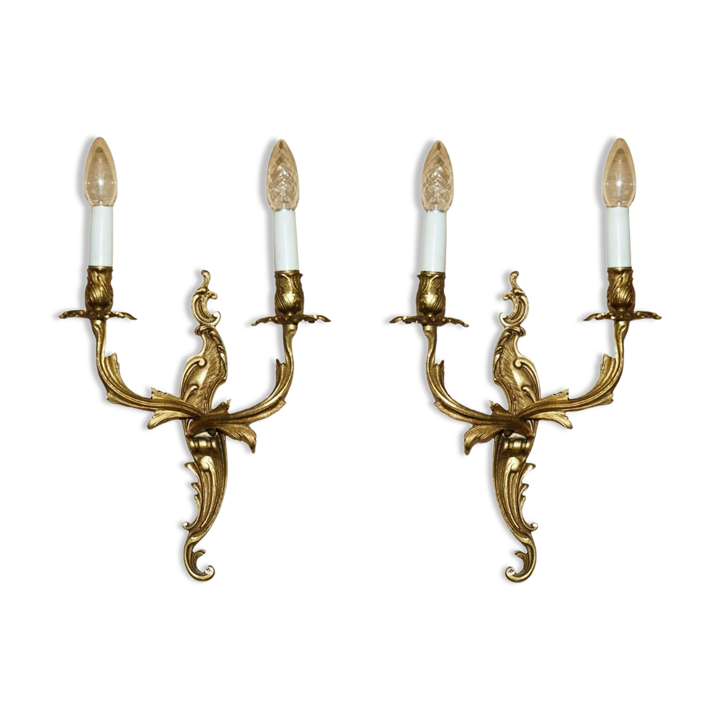 Pair of antique French wall sconces, gilded and bronzed, from the 1920s.