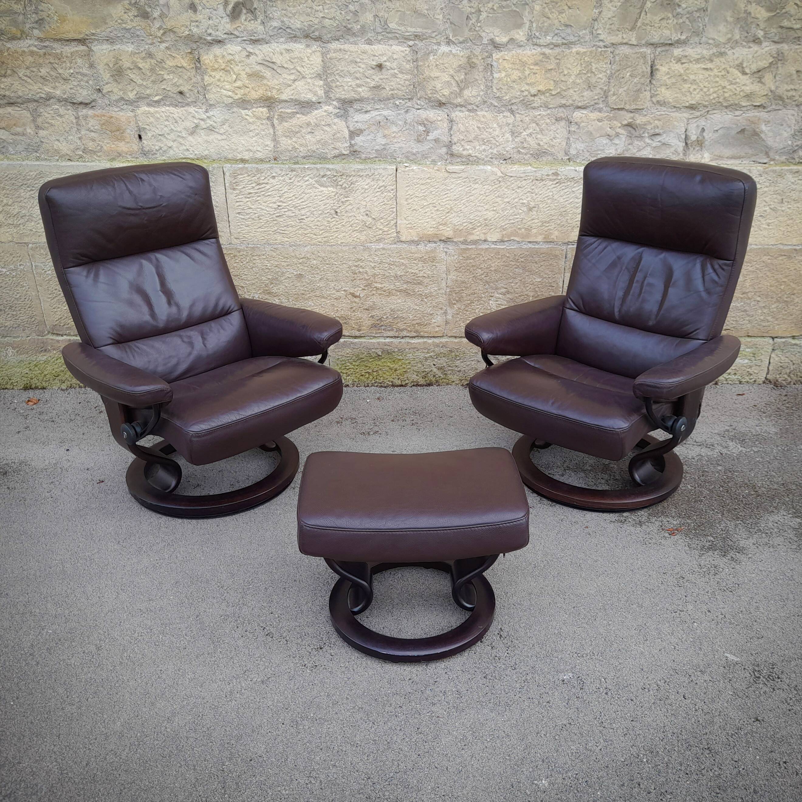Pair of Scandinavian leather armchairs and ottoman, Ekornes, Norway, 1970s