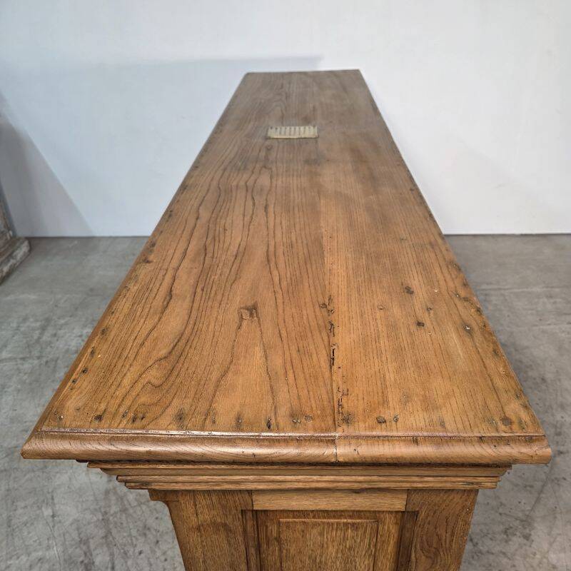 Important oak bar from a café around 1900.