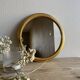 Miroir rond doré vintage