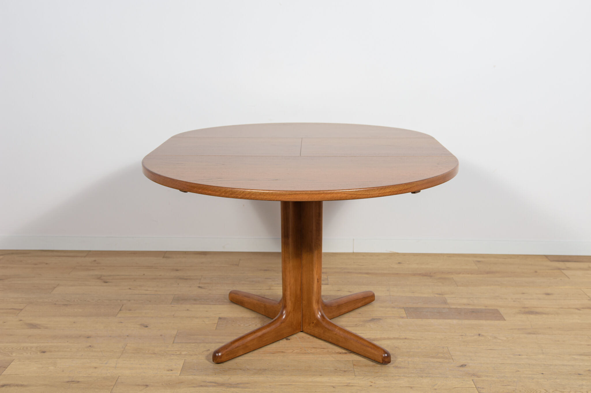 Table à manger ronde extensible en teck des années 1950, Royaume-Uni