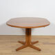 Table à manger ronde extensible en teck des années 1950, Royaume-Uni
