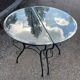 Glass and iron table with two side tables and 8 chairs