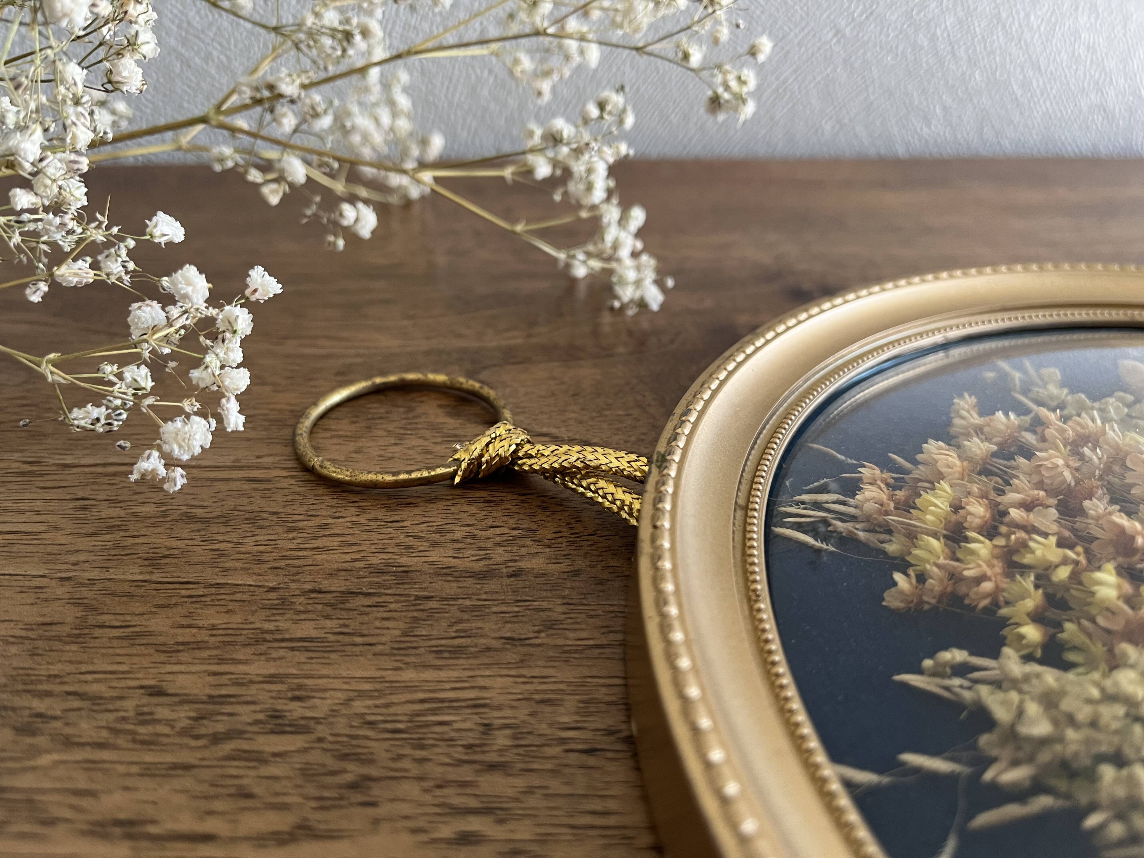 Cadre rond verre bombé fleurs séchées