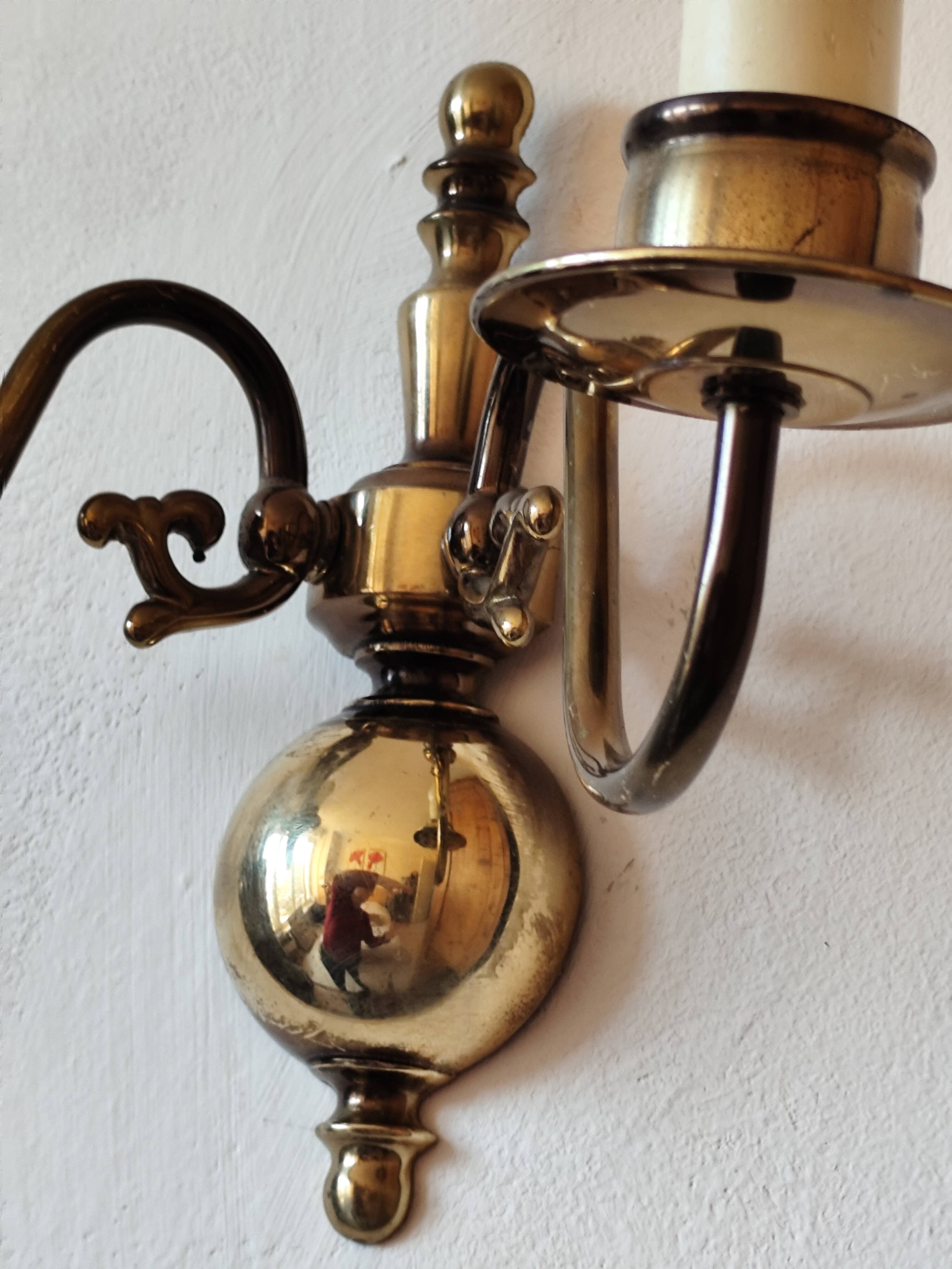 Pair of Dutch style 2-light brass wall lights
