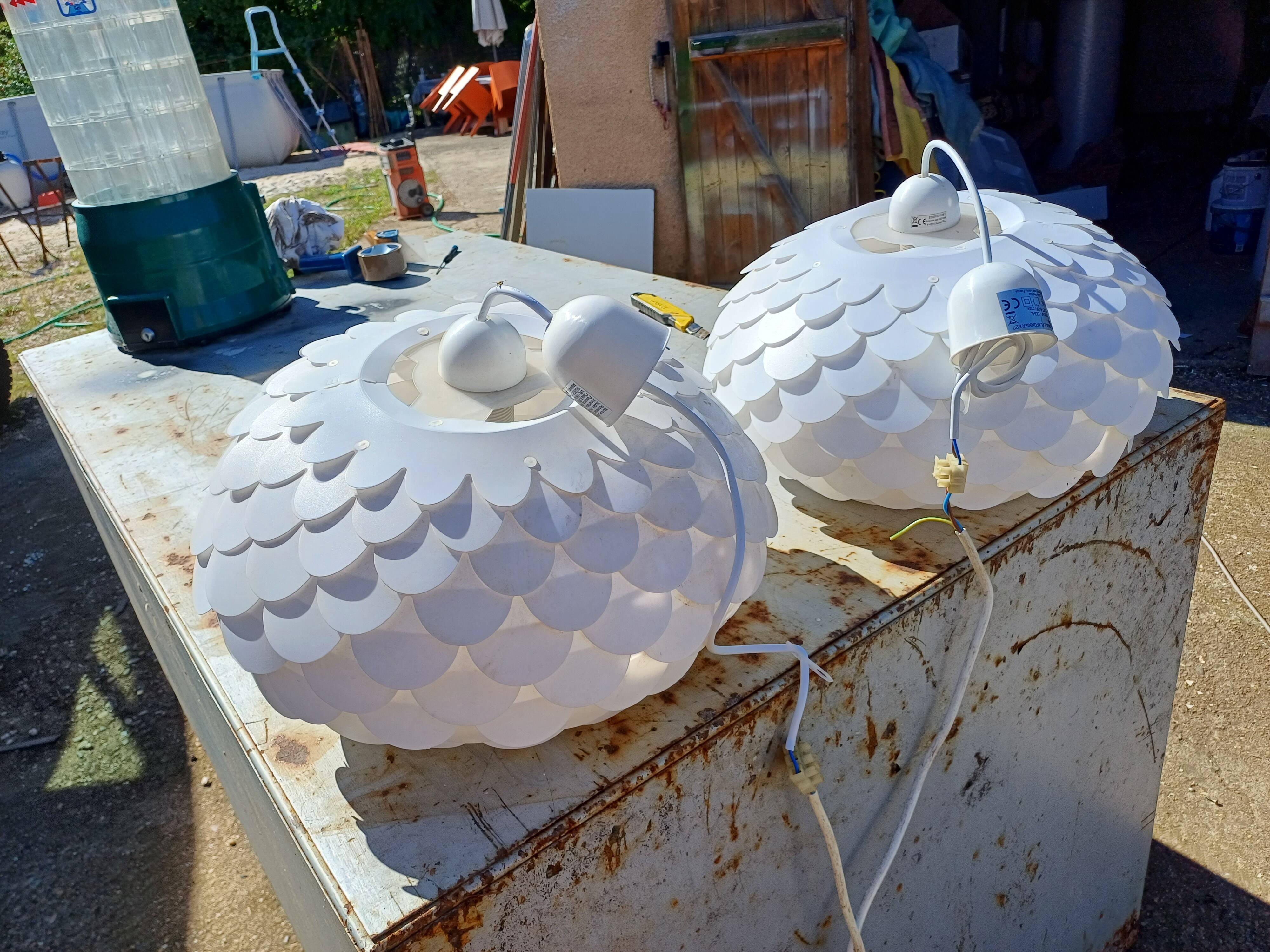 Pair of vintage white plastic pendant lights