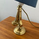 Ancienne lampe de bateau en bronze