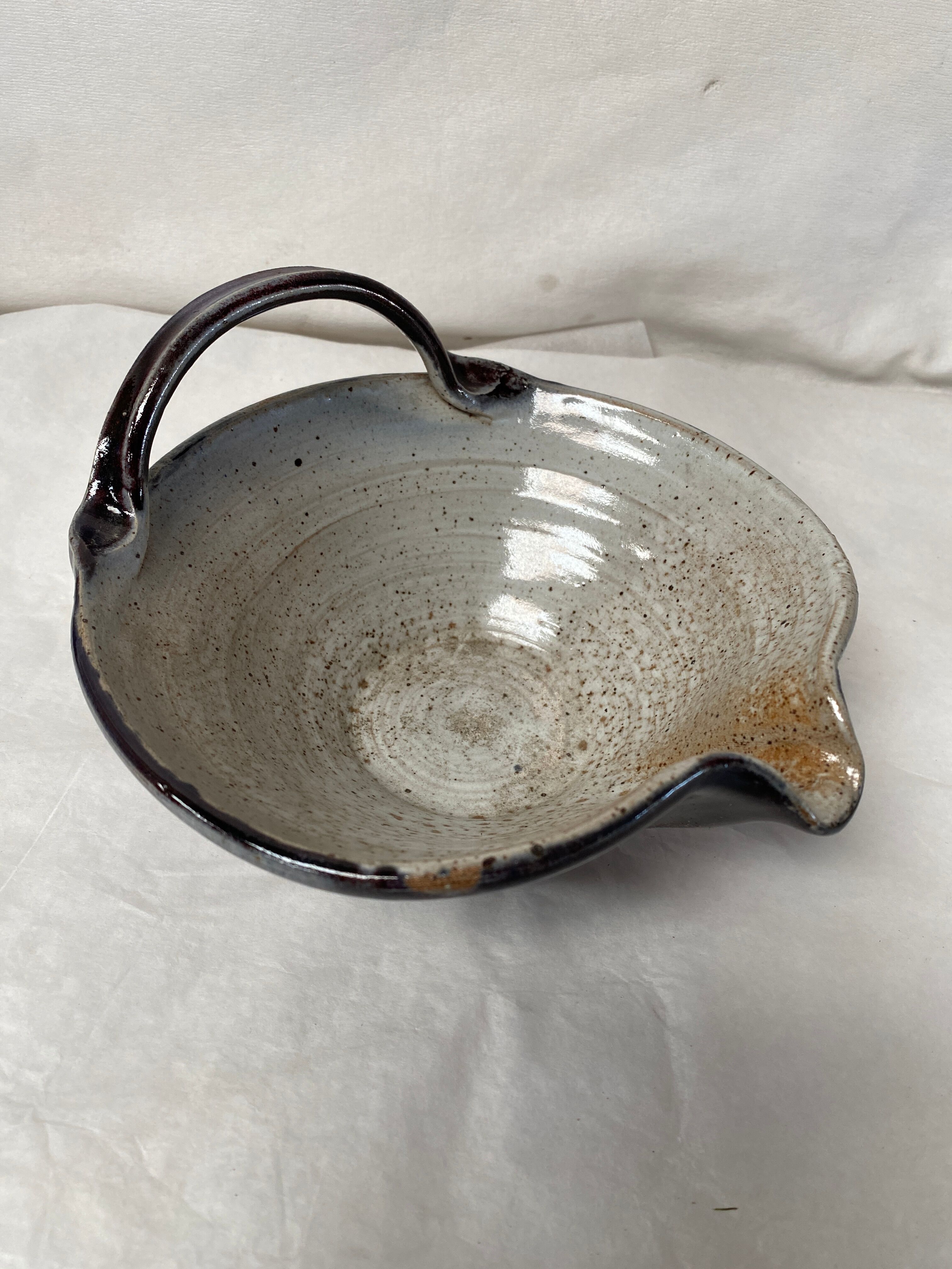 Signed sandstone dish